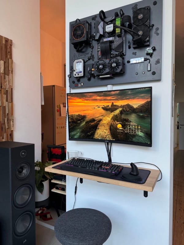 Completed wall-mounted PC with exposed components